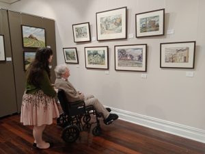 Megan Kelly and Grandfather viewing his paintings June 2020 report